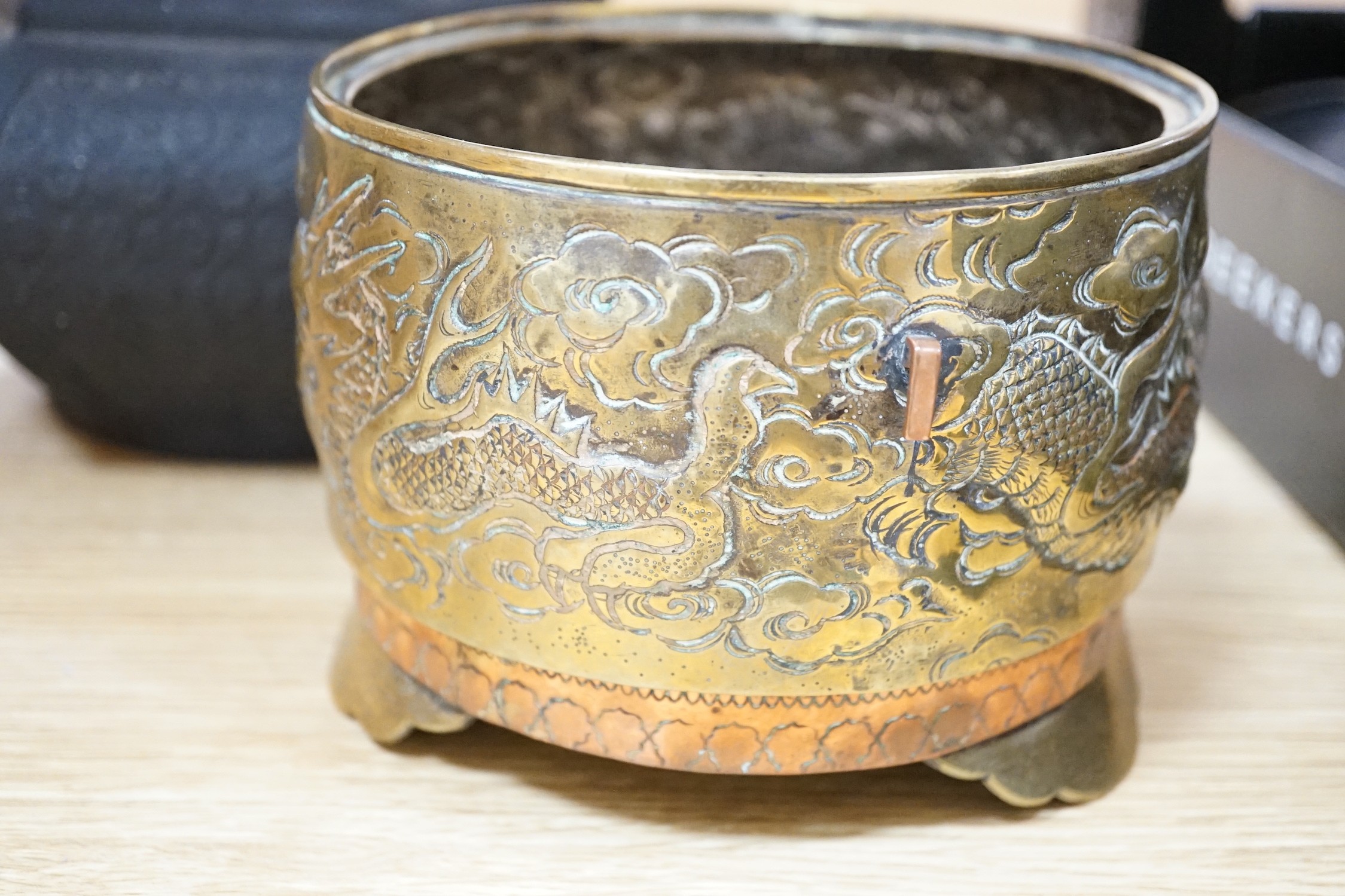 A Chinese copper and brass jardiniere and a faux bronze type vase